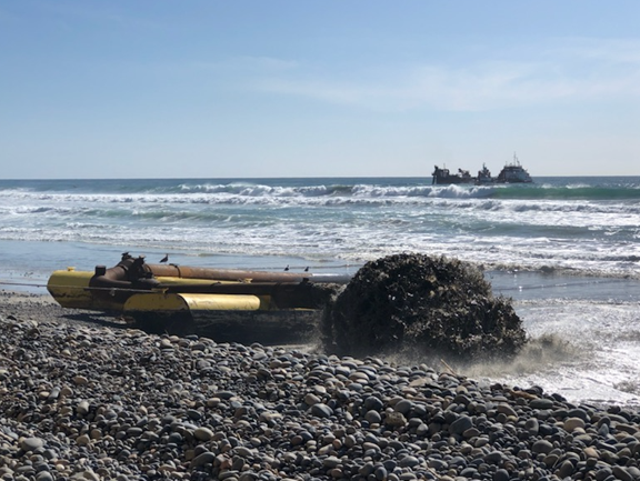 First load of sand sediment being placed north of D-Street beach from the subline.