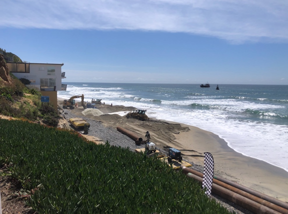 Beach fill and grading occurring near D-Street beach.