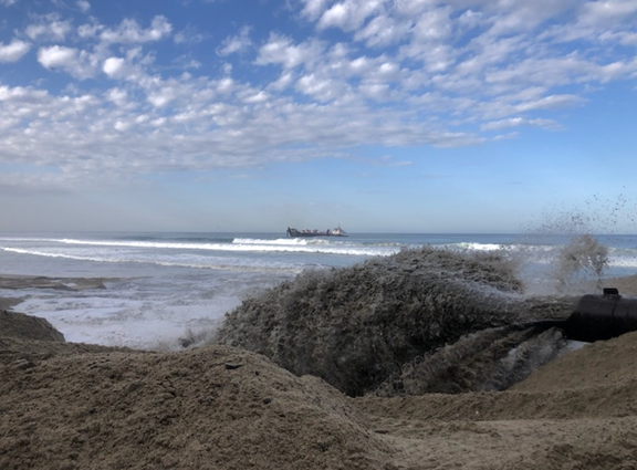 Sediment dispensing from the subline south of D-Street beach.